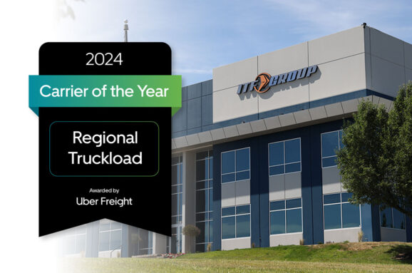 ITF Group headquarters with Uber Freight’s 2024 Carrier of the Year badge for Regional Truckload displayed in the foreground.